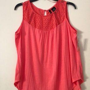 Never been worn Coral color tank top with embroidery around the neck line.